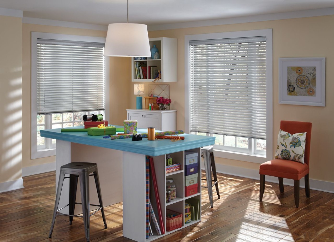 Bright home office with windows decorated with Hunter Douglas Modern Precious Metals® Mini Blinds near Alpharetta, GA